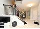 Open entryway with staircase, tile floors, and views of the dining area at 3237 Palatka St, Orlando, FL 32824