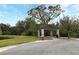 Community gazebo set among mature trees, offering a peaceful and shaded picnic spot at 3237 Palatka St, Orlando, FL 32824
