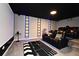 Stunning home theater features reclining chairs, carpet, and movie decor at 3237 Palatka St, Orlando, FL 32824