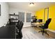 Bright office space with dual workstations, modern desk, and shelves, perfect for productivity at 3237 Palatka St, Orlando, FL 32824