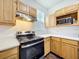 Efficient kitchen with modern appliances, ample cabinet space, and quartz countertops at 3403 Greenwich Village Blvd # 104, Orlando, FL 32835