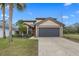Charming two-story home with a well-manicured lawn and a spacious two-car garage at 3509 S Saint Lucie Dr, Casselberry, FL 32707