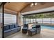 Comfortable screened-in patio with ample seating options overlooking the refreshing pool at 3509 S Saint Lucie Dr, Casselberry, FL 32707
