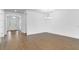 Bright dining area featuring wood-look tile floors and an elegant chandelier at 4192 Barbuda Ln, Kissimmee, FL 34758