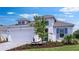 Charming single-Gathering home with a manicured front yard at 4192 Barbuda Ln, Kissimmee, FL 34758