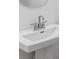 White pedestal sink in a modern bathroom at 4198 Barbuda Ln, Kissimmee, FL 34758