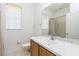 Bathroom featuring vanity with white countertops and decorative tile backsplash at 438 Belfry Dr, Davenport, FL 33897