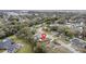 An aerial view showcases the neighborhood of the property with many mature trees and nearby amenities at 453 Weathersfield Ave, Altamonte Springs, FL 32714