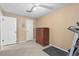 Bedroom featuring tiled floor, ceiling fan, treadmill, and large closet at 453 Weathersfield Ave, Altamonte Springs, FL 32714