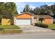 Well-maintained single-story home with a two-car garage and nice landscaping at 453 Weathersfield Ave, Altamonte Springs, FL 32714