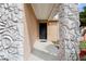 Close-up of the front entry, featuring stone accents and a black front door at 453 Weathersfield Ave, Altamonte Springs, FL 32714