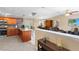 Spacious kitchen with wooden cabinetry, granite countertops, and stainless steel appliances at 453 Weathersfield Ave, Altamonte Springs, FL 32714