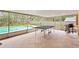 This enclosed patio offers seamless indoor-outdoor living, perfect for entertaining by the pool at 453 Weathersfield Ave, Altamonte Springs, FL 32714