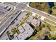 Aerial view of condo complex with private pool, parking, and nearby roadways at 4575 S Texas Ave # 205, Orlando, FL 32839