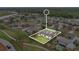 Overhead view shows the house's location in a neighborhood near the lake and the community at 5071 Heatherstone Dr, Kissimmee, FL 34758