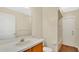 Well-lit bathroom with a single sink, vanity, toilet and shower-tub combo at 5071 Heatherstone Dr, Kissimmee, FL 34758