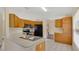 Well-equipped kitchen with stainless steel appliances, tile floor, and ample cabinet storage at 5071 Heatherstone Dr, Kissimmee, FL 34758