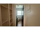 En suite bathroom featuring tiled floor, vanity and a window providing natural light at 5200 Brosche Rd, Orlando, FL 32807