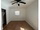 Bedroom with a large window, ceiling fan and closet with sliding doors at 5200 Brosche Rd, Orlando, FL 32807
