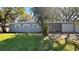 This single-story home has three windows, a one-car garage, and a well maintained yard with mature trees and landscaping at 5200 Brosche Rd, Orlando, FL 32807