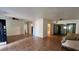 Spacious living room with tile flooring, ceiling fan, and open floor plan at 5200 Brosche Rd, Orlando, FL 32807