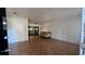 Bright living room featuring tile floors and an open layout, ideal for gatherings at 5200 Brosche Rd, Orlando, FL 32807