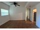 Open living area with tile floors and view to the hallway at 5200 Brosche Rd, Orlando, FL 32807