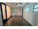 Sunlit room with tile floors and sliding glass doors leading to outdoor area at 5200 Brosche Rd, Orlando, FL 32807