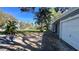 This shows a side view of the yard of the home at 5200 Brosche Rd, Orlando, FL 32807
