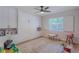 Bedroom with built-in Murphy bed, natural light and playroom at 7614 Lake Dr, Belle Isle, FL 32809