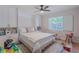 Bedroom with built-in Murphy bed, natural light and playroom at 7614 Lake Dr, Belle Isle, FL 32809