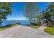 Community boat ramp with a dock and access to a large lake at 7614 Lake Dr, Belle Isle, FL 32809