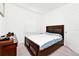 Neutral bedroom with a full bed and dresser at 780 Livestock Loop, St Cloud, FL 34771