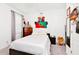 Cozy bedroom with a comfortable bed, dresser and decor at 780 Livestock Loop, St Cloud, FL 34771