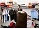 Walk-in closet with clothes, shoes and accessories at 780 Livestock Loop, St Cloud, FL 34771