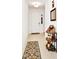 Welcoming entryway features a neutral color scheme, tile flooring, and stylish decorative elements at 780 Livestock Loop, St Cloud, FL 34771