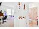 Bright hallway with a view of the office space and a bathroom at 780 Livestock Loop, St Cloud, FL 34771