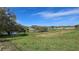 Scenic view of backyard, including pond at 7813 Arabian Pl, Orlando, FL 32818