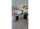Bright kitchen with white cabinets, updated appliances, and ample counter space at 7813 Arabian Pl, Orlando, FL 32818