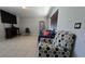 Comfortable living room with tile floors and stylish furnishings at 7813 Arabian Pl, Orlando, FL 32818