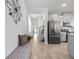 Open-concept living space with modern finishes and ample natural light at 9747 Petition Way, Orlando, FL 32832
