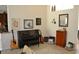 Cozy living room featuring a piano, guitar, and a unique collection of art and decor at 4847 Lake Milly Dr, Orlando, FL 32839