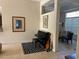 Inviting living space with a piano, dining area, and decorative accents for a modern feel at 4847 Lake Milly Dr, Orlando, FL 32839