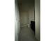 Bathroom with tile floors, a toilet, shower, and a dark vanity with a mirror at 124 Sofia Ln, Lake Alfred, FL 33850