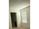 Bedroom with attached bathroom and a window that allows natural light to brighten the space at 124 Sofia Ln, Lake Alfred, FL 33850