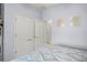 Bedroom featuring neutral walls, and large closet spaces at 12824 Penshurst Ln, Windermere, FL 34786