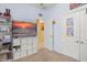 Bright bedroom featuring closet storage and a modern entertainment center at 12824 Penshurst Ln, Windermere, FL 34786