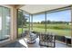 Enjoy the outdoors on this screened patio with views of open green space at 12824 Penshurst Ln, Windermere, FL 34786