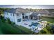 Stunning home with a private pool, stylish patio, and lush landscaping, ideal for elegant outdoor living at 13305 Bellaria Cir, Windermere, FL 34786