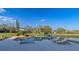 Luxury backyard pool with stunning views of the lake and lush landscaping at 13305 Bellaria Cir, Windermere, FL 34786